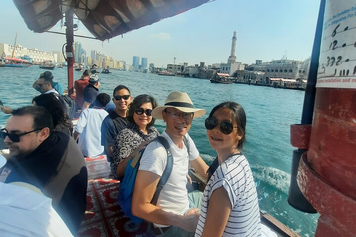 Experience the charm of Dubai Creek as you sail aboard an Abra taking in the historic sites and connecting with local culture while sampling delicious street food delights.